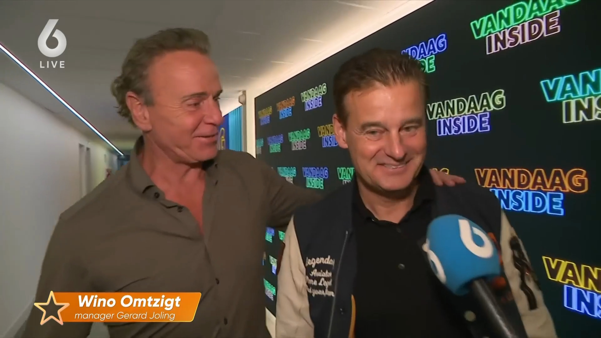 Manager Gerard Joling, Wino, spreekt Wilfred Genee aan: geen vragen over biergooi-incident